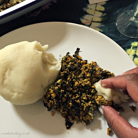 Eating pounded yam the traditional way at Tokunbo's Kitchen