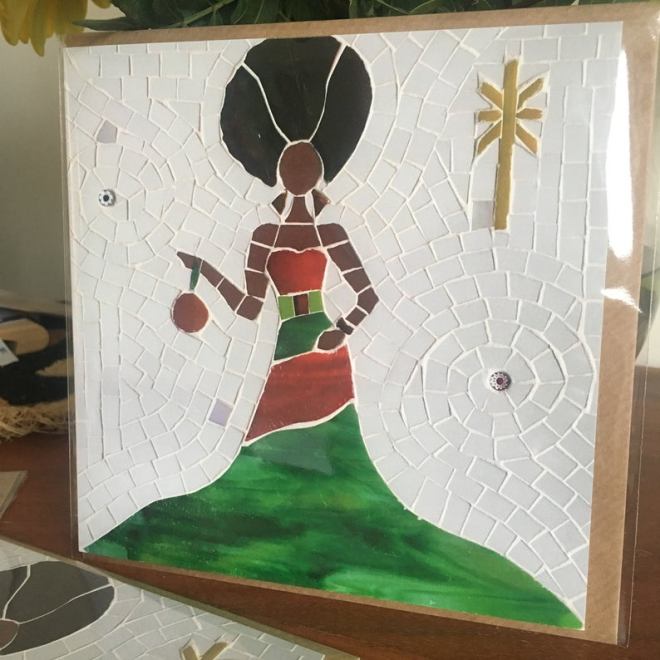 festive mosaic christmas card featuring an african woman 